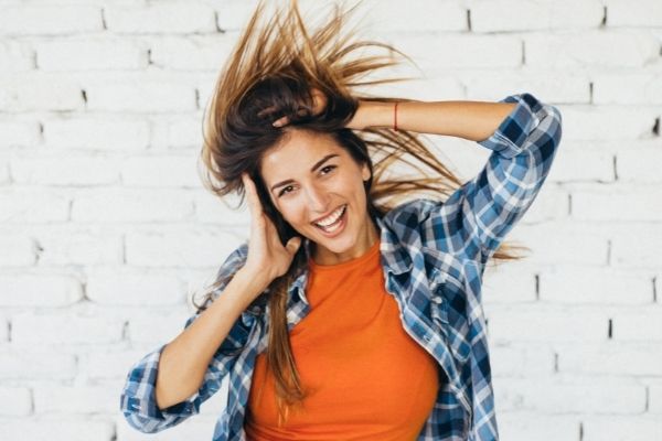Woman moving the body by dancing