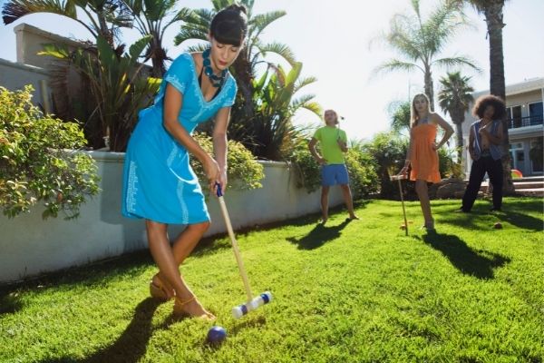 friends playing croquet for better health
